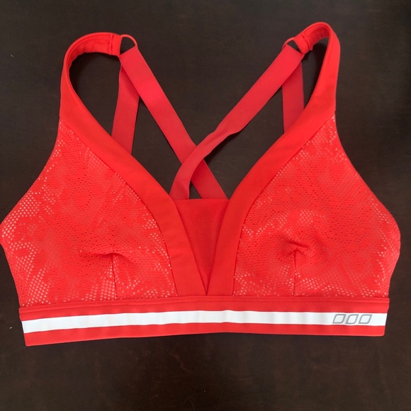 red and white sports bra